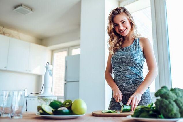 The girl prepares food according to the principles of the No. 1 diet for gastritis